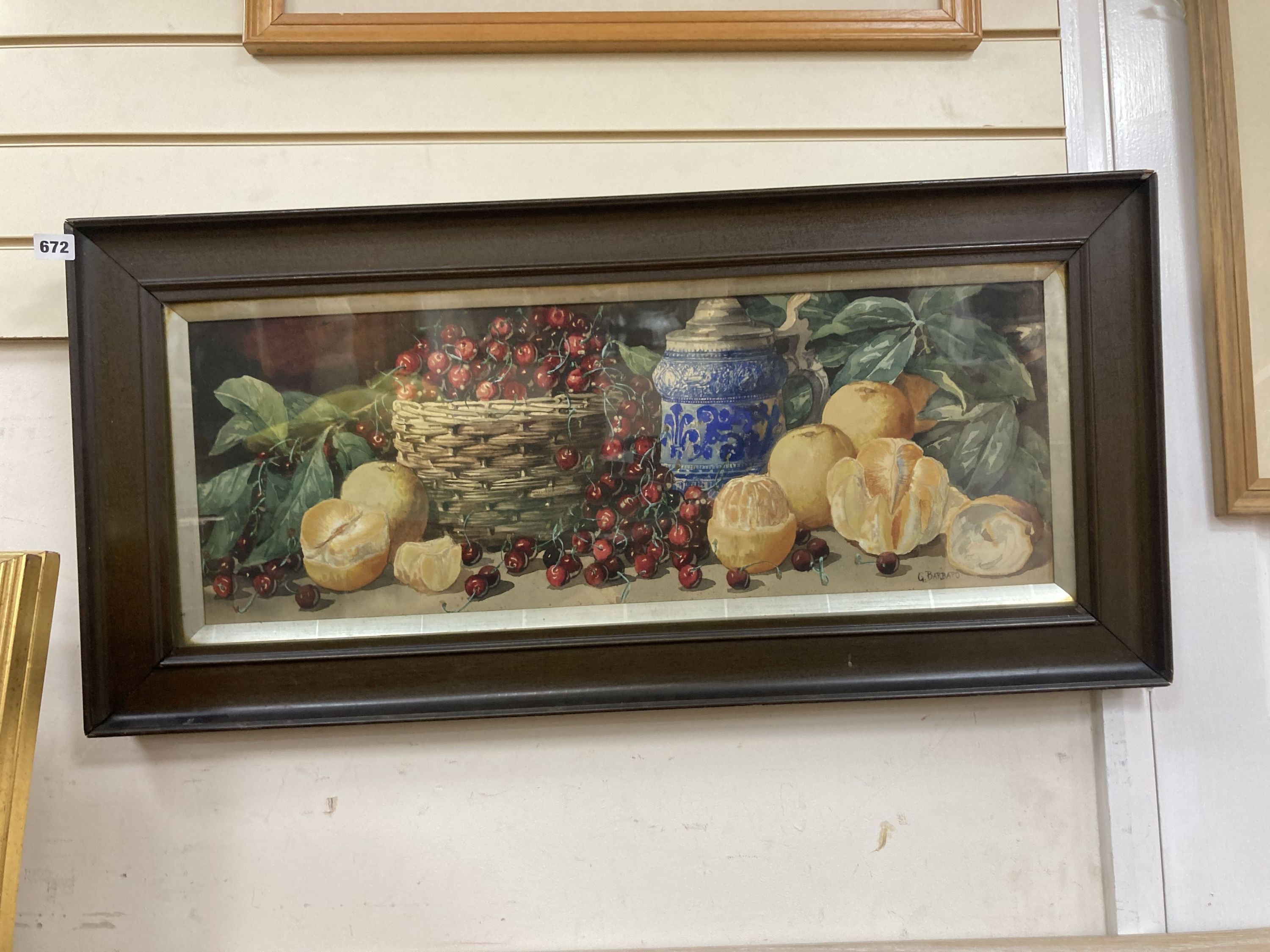 Giovanni Barbaro (1864-1915), watercolour, Still life of fruit and a stein on a ledge, signed, 27 x 76cm